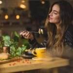 a woman enjoying her food
