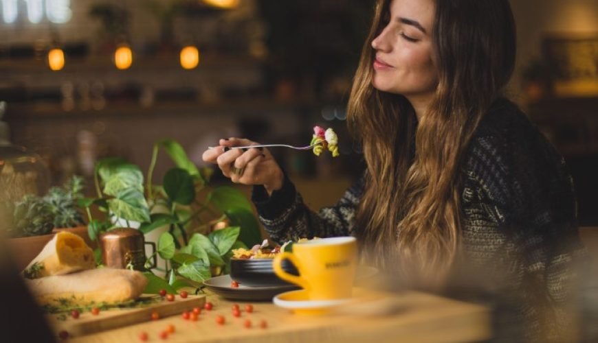 a woman enjoying her food