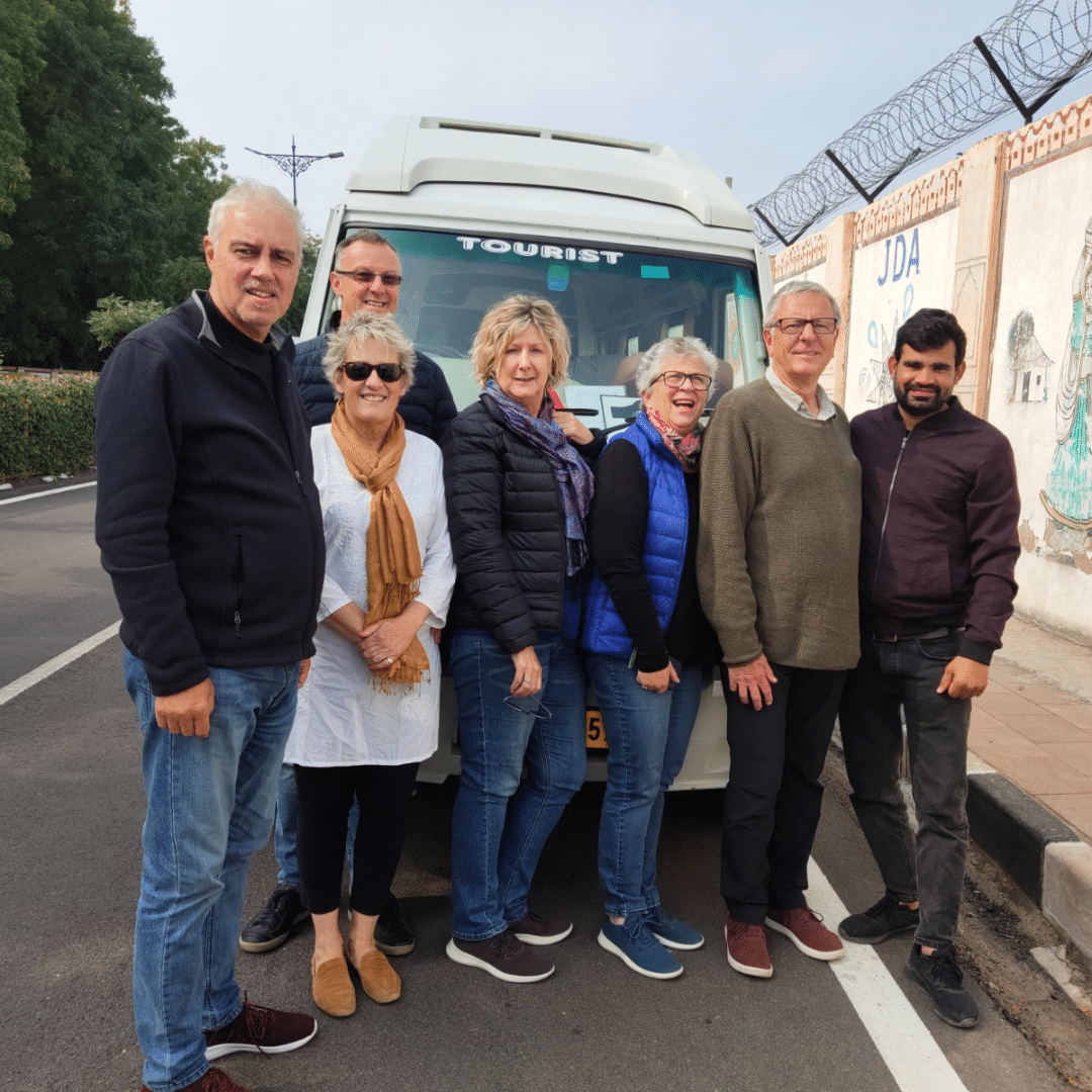 a group of peoples standing on a road