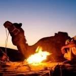 indian-men-resting-by-bonfire