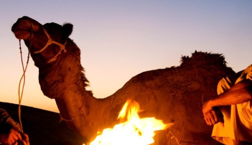 indian-men-resting-by-bonfire