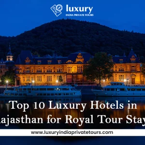 Luxurious hotel by river at night with hills, top 10 Rajasthan royal stays