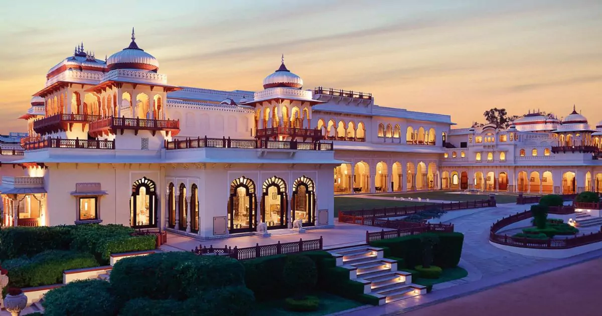 Romantic Jaipur resort at dusk with marble arches, domes, and gardens for a luxury getaway 