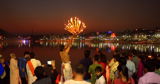 Evening aarti ceremony at Pushkar Lake, Rajasthan, India.